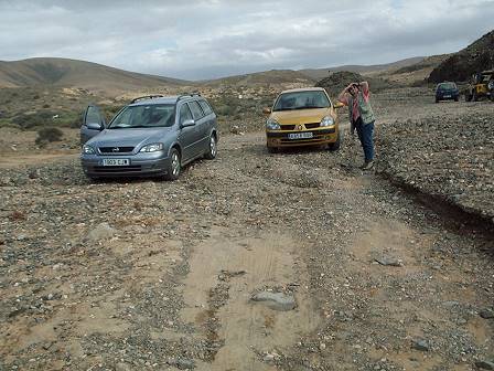 The dirt road becomes a car park ...