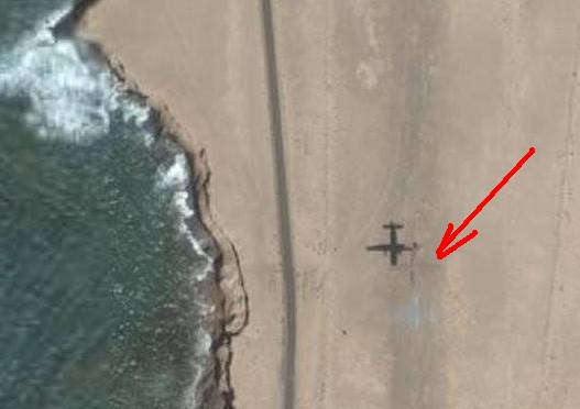 Flugzeugschatten ber der alten Piste: Was will der hier ..?